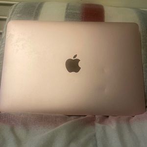MacBook Retina 12” for sale. This MacBook is Rose gold w/ some blemishes.